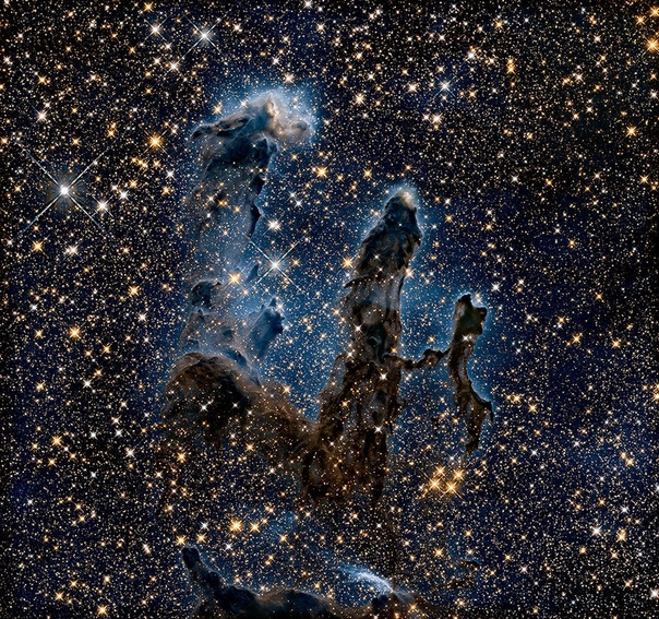 Фантастический снимок Столпов Творения в инфракрасном спектре Это невероятное фото межзвездного скопления «Столпы Творения» в туманности Орел от НАСА, сделанное телескопом Хаббла. Оно стало